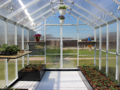 Greenhouse with hanging table